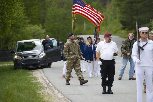 4G0A9306 Members of American Legion Brighton Post 80 march during the Island Pond Memorial Day parade.