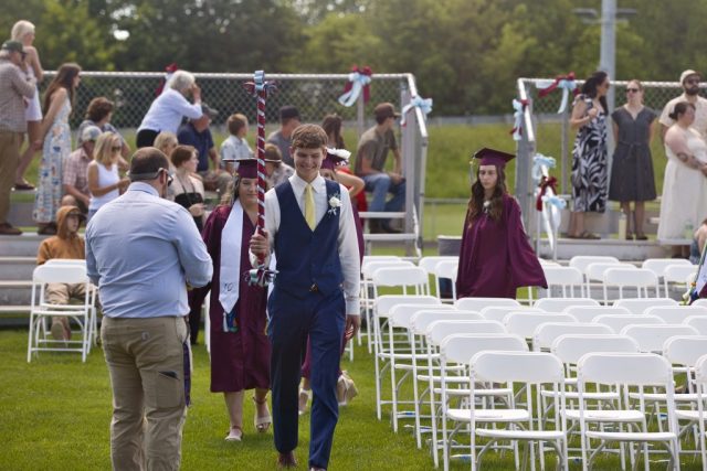 A North Country Union High School graduate smiles during the 2026 commencement ceremony