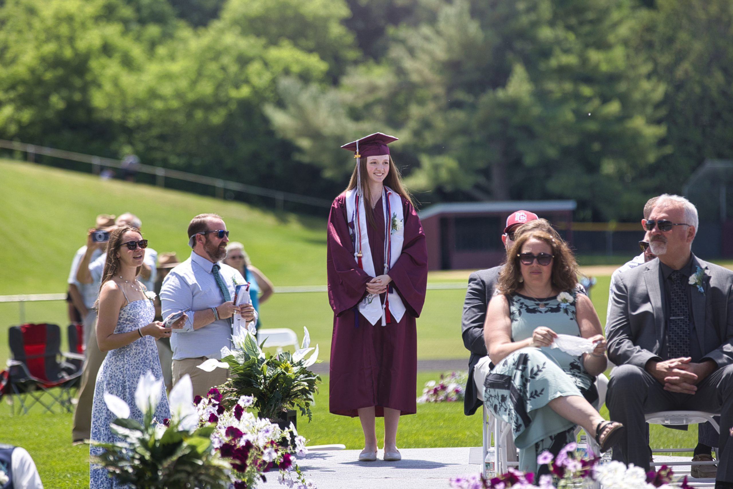 A North Country Union High School graduate smiles during the 2026 commencement ceremony