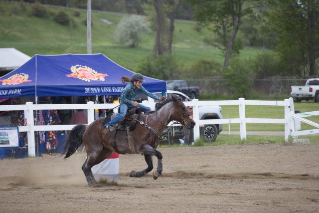 Emmah Davis races against the clock during equestrian competition