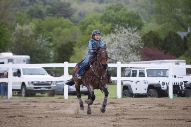 Emmah Davis races against the clock during equestrian competition